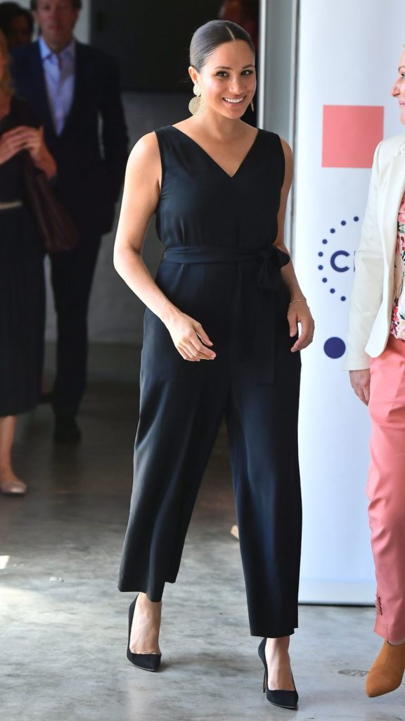 MEGHAN MARKLE WEARS REPEAT EVERLANE JUMPSUIT AND GAS BIJOUX EARRINGS TO ...